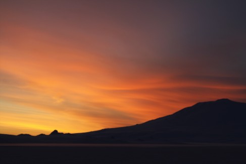 "Sunset" colors behind Mt Erebus